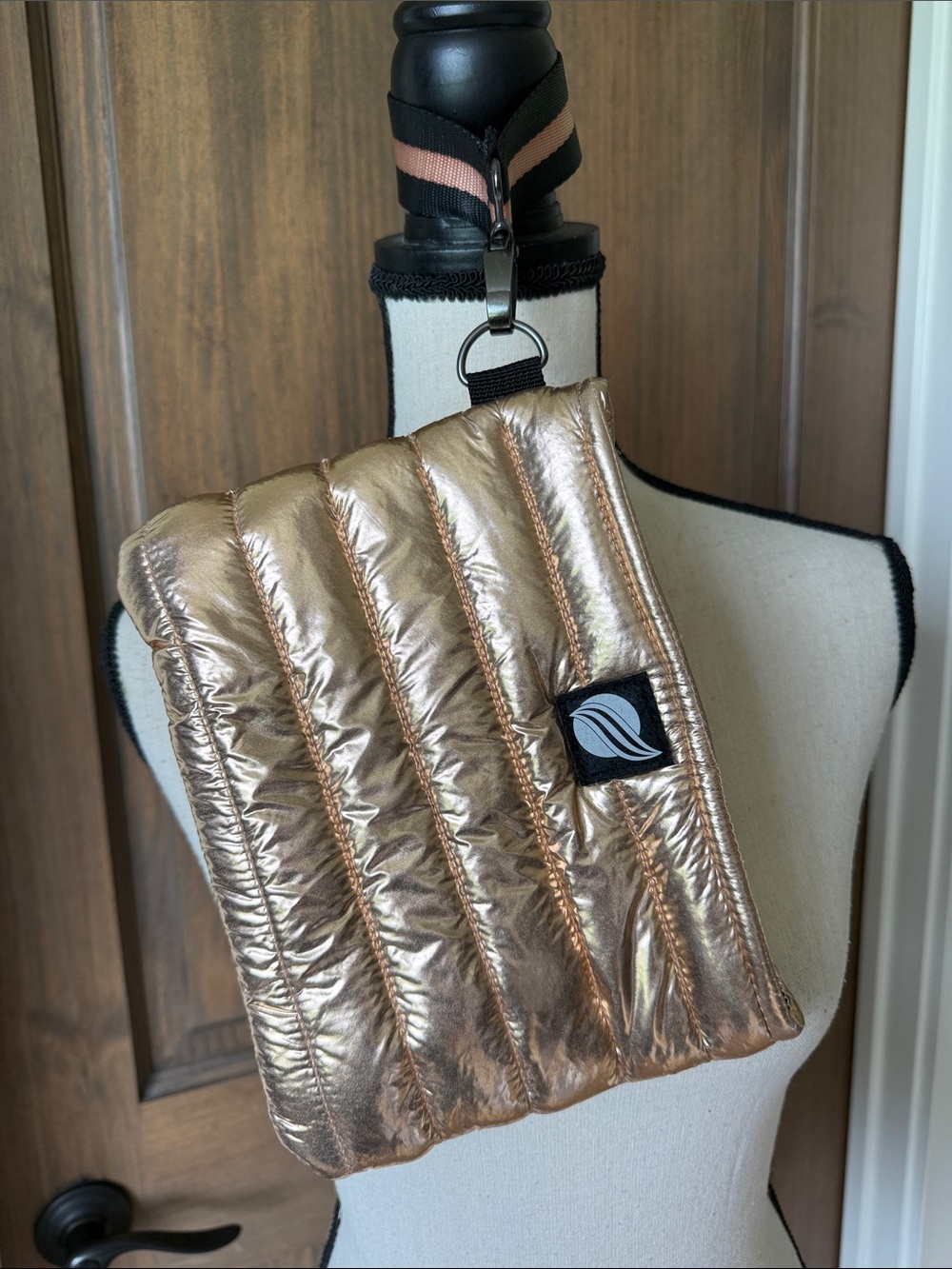THINK ROYLN Metallic Rose Gold Quilted Wristlet Bag